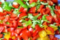 Crispy delicious vegetarian green, yellow and red bell peppers sliced and cut, close up view Royalty Free Stock Photo