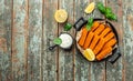 Crispy Fish fingers set on a wooden background. Long banner format. top view Royalty Free Stock Photo