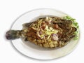 Crispy freshwater fish with three flavors of fresh vegetables and Asian cuisine