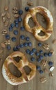 Bavarian salted sesame pretzels on table.