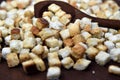 Crispy freshly sauteed crunky croutons made of cubes white bread.