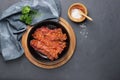 Crispy fried bacon in a cast iron pan. Royalty Free Stock Photo