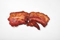 Crispy fried bacon isolated on a white background. Royalty Free Stock Photo