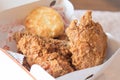 Crispy fried chicken and biscuit from Popeye's fast food restaurants