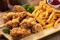 Crispy fried chicken tenders and french fries Royalty Free Stock Photo