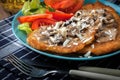 Crispy fried homemade potato pancakes with mushroom sauce Royalty Free Stock Photo