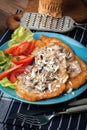 Crispy fried homemade potato pancakes with mushroom sauce Royalty Free Stock Photo