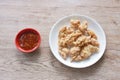 crispy fried Korean chicken with bread crumb and egg yolk on plate dipping barbecue sauce Royalty Free Stock Photo