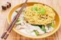 Crispy fried noodle with pork soaked in gravy Royalty Free Stock Photo