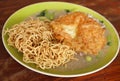 Crispy fried noodles with omelet Royalty Free Stock Photo