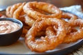 Crispy fried onion rings served with dipping sauce Royalty Free Stock Photo