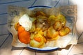 Crispy fried Patatas bravas with spicy sauces to beer
