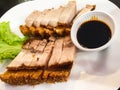 Crispy fried pork with sweet and rich sauce. This is a main menu, eaten with rice and fresh salads