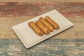 Crispy fried tequeÃÂ±os with small blisters on the surface of the dough, making them even more visually appetizing Royalty Free Stock Photo