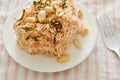 Crispy fried thin rice noodles with coconut cream topping peanut and slice lemon leaf on plate Royalty Free Stock Photo