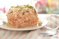 Crispy fried vermicelli noodles with coconut cream topping peanut and slice lemon leaf on plate Royalty Free Stock Photo