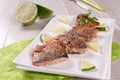 Crispy fried white fish fillets with lime Royalty Free Stock Photo