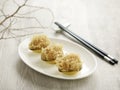 Crispy-fried Yam Ring with Scallop and Diced Chicken served in a dish side view on dark backgroundCrispy-fried Yam Ring with