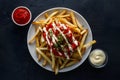 Crispy fries with tomato sauce and mayonnaise in foodgraphy
