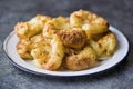 Crispy golden baked smashed potatoes Royalty Free Stock Photo