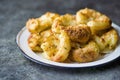 Crispy golden baked smashed potatoes Royalty Free Stock Photo