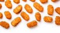 Crispy, golden brown chicken nuggets arange on white background, a popular fast food high fat,calories