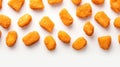 Crispy, golden chicken nuggets on a white background