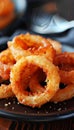 Crispy and golden onion rings fried to perfection in bubbling oil for a delightful snack