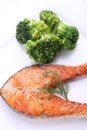 Crispy grilled salmon steak with broccoli