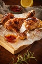 Crispy grilled seasoned chicken legs or drumsticks