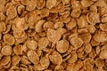 Crispy healthy dry cereal flakes as a background texture