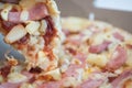 Crispy hot pizza with ham and pineapples Royalty Free Stock Photo