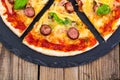 Crispy hot pizza on old wooden table Royalty Free Stock Photo