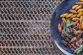 Crispy insects are served in black ceramic plates placed on tables made of steel grates, and fried insects are a popular food Royalty Free Stock Photo