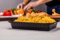 Crispy Kabsa Meal with chicken piece served in a dish isolated on grey background side view