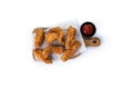 Crispy Kentucky fried chicken on cutting board isolated Royalty Free Stock Photo