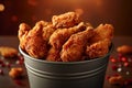 Crispy Kentucky fried chicken piled high in a bucket