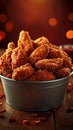 Crispy Kentucky fried chicken piled high in a bucket