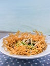 Crispy noodles in thick gravy