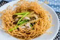 Crispy noodles in thick gravy