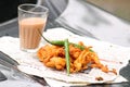 Crispy pakoras, Aloo pakoda, pyaaz pakoda, mirchi pakoda in rainy season with hot chai or tea