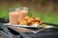 Crispy pakoras, Aloo pakoda, pyaaz pakoda, mirchi pakoda in rainy season with hot chai or tea