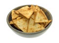Crispy pita snack crackers in an old bowl Royalty Free Stock Photo
