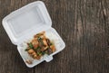 Crispy pork with Basil fried rice in foam box Royalty Free Stock Photo