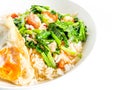 Crispy pork with Chinese broccoli on rice and fried egg Royalty Free Stock Photo