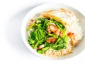 Crispy pork with Chinese broccoli on rice and fried egg Royalty Free Stock Photo
