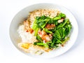 Crispy pork with Chinese broccoli on rice and fried egg Royalty Free Stock Photo