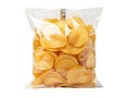 Crispy potato chips in a clear plastic bag isolated on white background Royalty Free Stock Photo