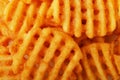 Crispy potato waffles fries, wavy, crinkle cut, criss cross cries Royalty Free Stock Photo