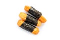 Crispy rice cakes wrapped in seaweed on white background. Nori maki rice crackers. snack food. Royalty Free Stock Photo